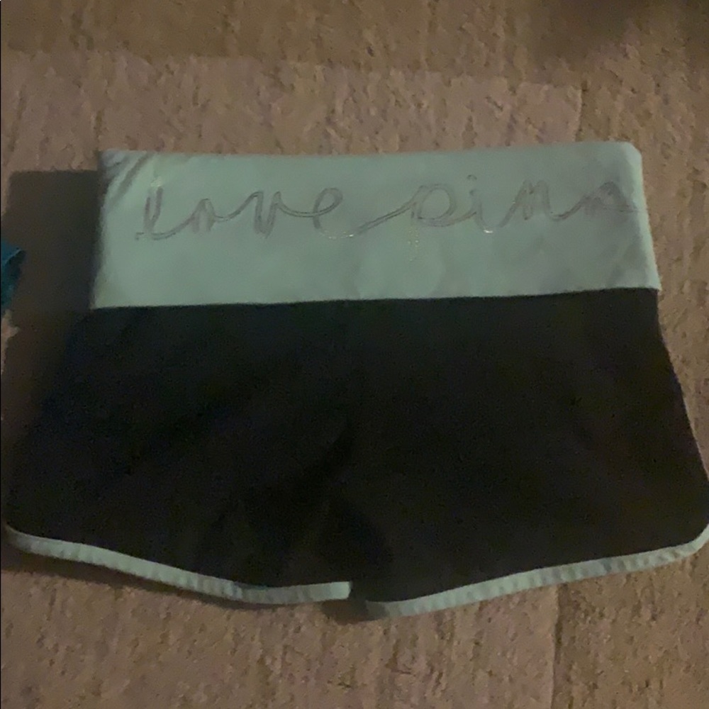 Black and mint yoga shorts from pink